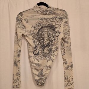 Fashion Nova Beige and Black Patterned Garment